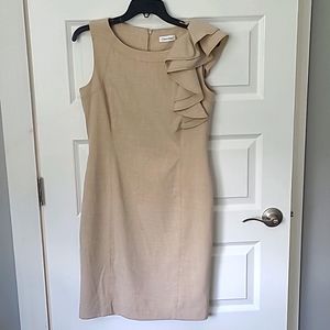 Sleeveless dress with ruffle accent